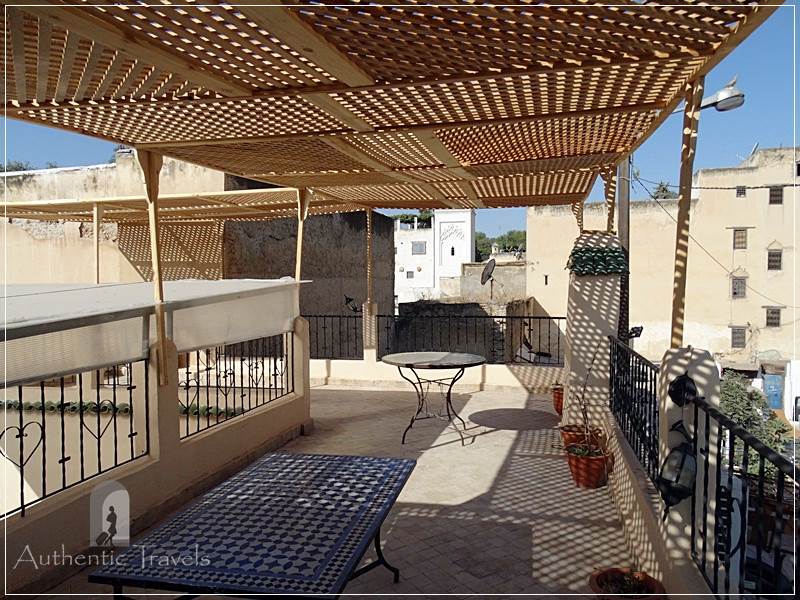 Casa Aya Medina: the upper terrace with a wooden pergola
