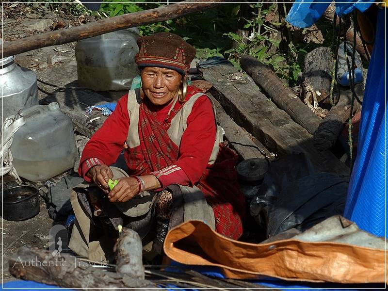 Tamang Heritage Trail - Day 2: Heading toward the Bamdang Khola Valley - local woman at work in the household