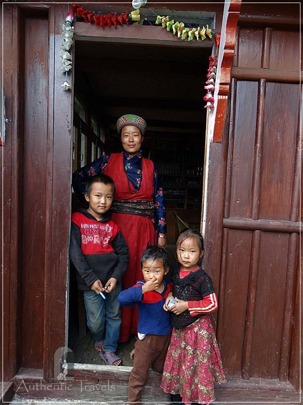 Tamang Heritage Trail - Day 2: Cherka hamlet - a woman with her children at Cherka Hotel & Waterfall Viewpoint