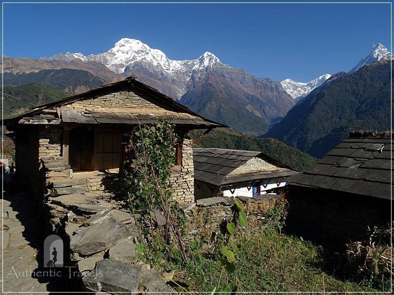 Ghorepani Trek: Ghandruk - traditional Gurung house with views to Annapurna South Peak and Modi Khola (valley)