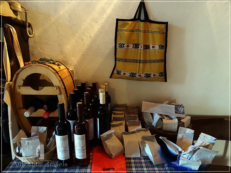 Etno House Shancheva - traditional products displayed in the lobby of the house (wine, brandy, rakija, aromatic salt, and dried herbs)
