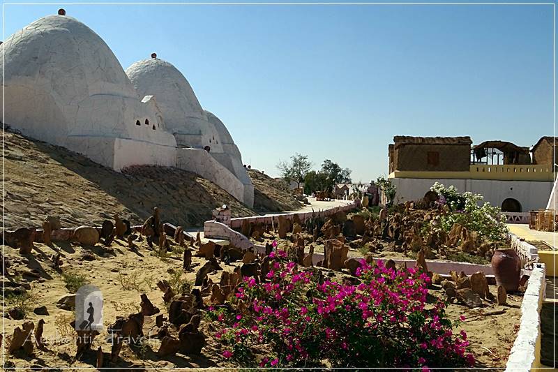 The whitewashed domed cottages